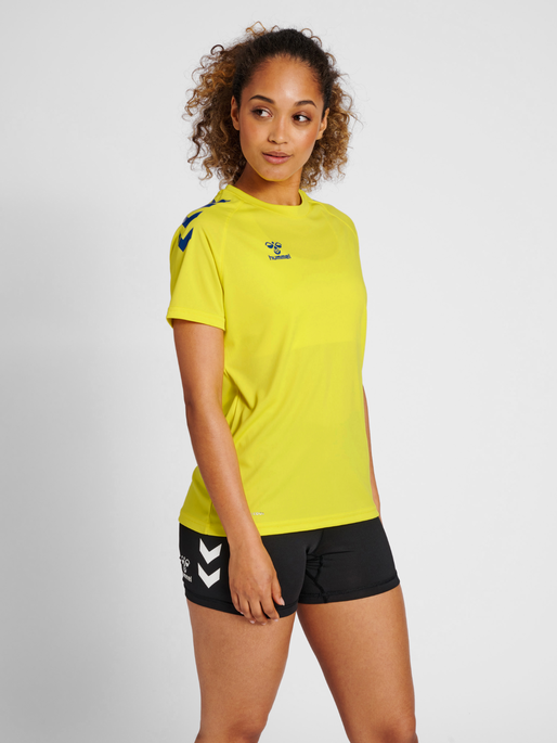 hmlCORE XK CORE POLY TEE  S/S WOMAN, BLAZING YELLOW/TRUE BLUE, model